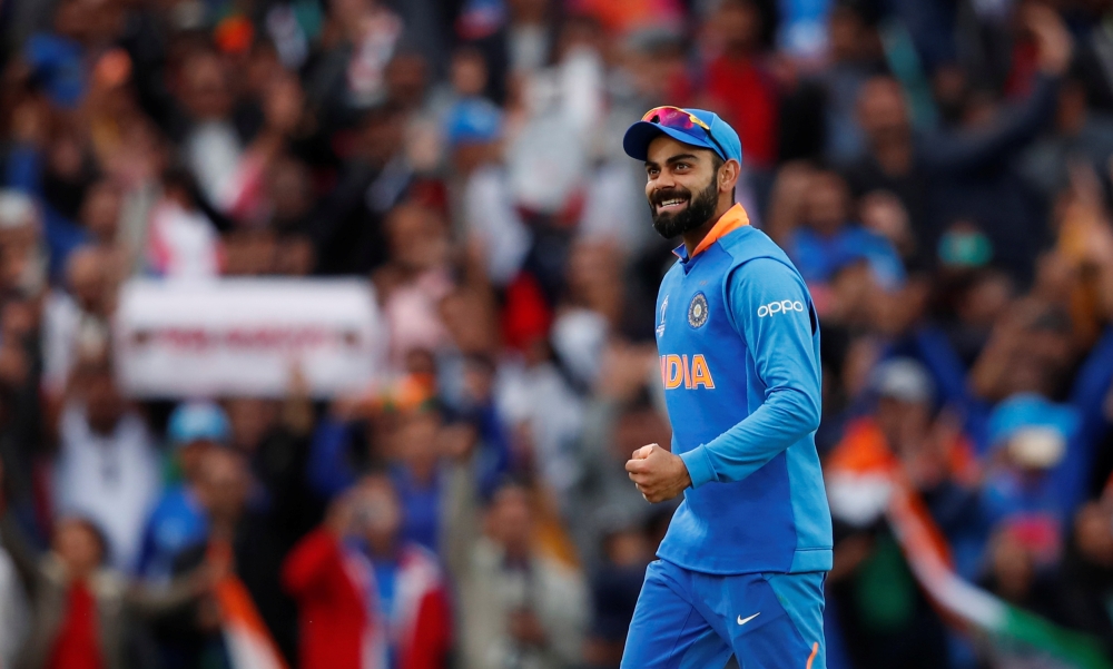 India's Virat Kohli celebrates at the end of the match against Australia. Reuters/Andrew Boyers