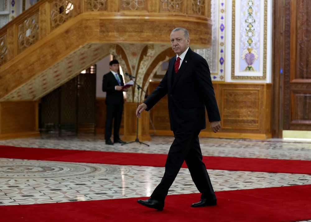 Turkish President Recep Tayyip Erdogan is welcomed by his Tajikistani counterpart Emomali Rahmon (not seen) during the 5th summit of the Conference on Interaction and Confidence Building Measures in Asia (CICA) in Dushanbe, Tajikistan on June 15, 2019. Ce