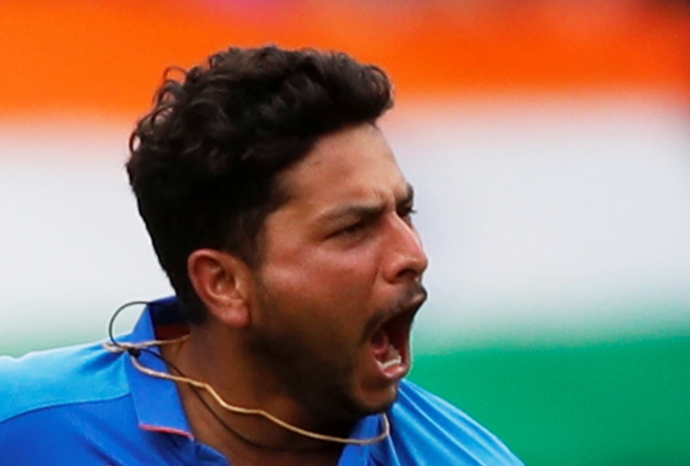 India's Kuldeep Yadav celebrates the wicket of Pakistan's Babar Azam Action Images via Reuters/Lee Smith