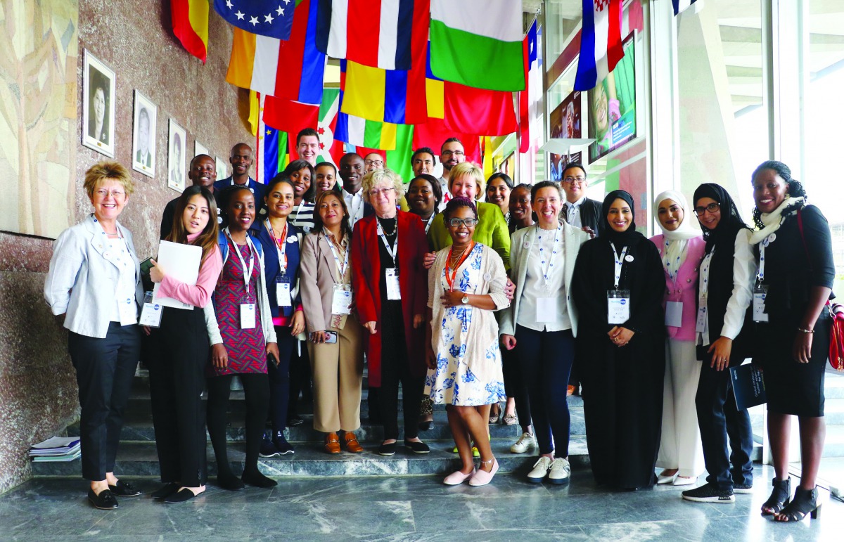 Global young nursing leaders and workshop facilitators pose for a group photo at the World Health Organization (WHO) headquarters in Geneva.