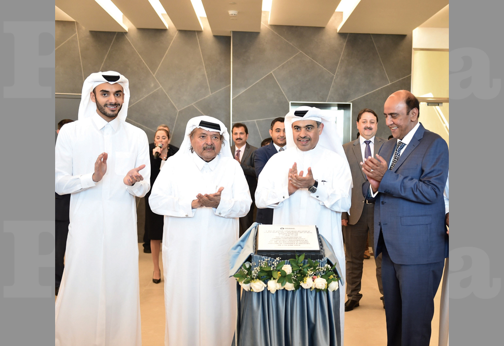 H E Ali bin Ahmed Al Kuwari, Minister of Commerce & Industry (second right); Qatar Businessmen Association Chairman Sheikh Faisal bin Qassim Al Thani (second left) and other officials during the event. 