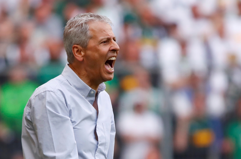 FILE PHOTO: Borussia Dortmund coach Lucien Favre reacts REUTERS/Wolfgang Rattay
