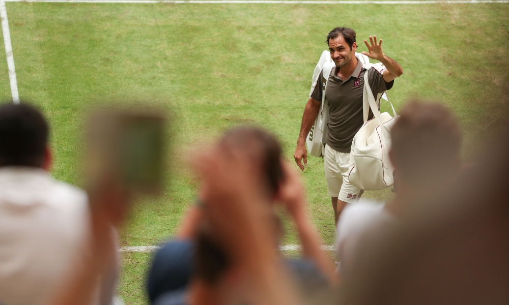 Switzerland's Roger Federer reacts after winning the first round tennis match against Australia's John Millman at the ATP Open tennis tournament in Halle, western Germany, on June 18, 2019. AFP / dpa / Friso Gentsch