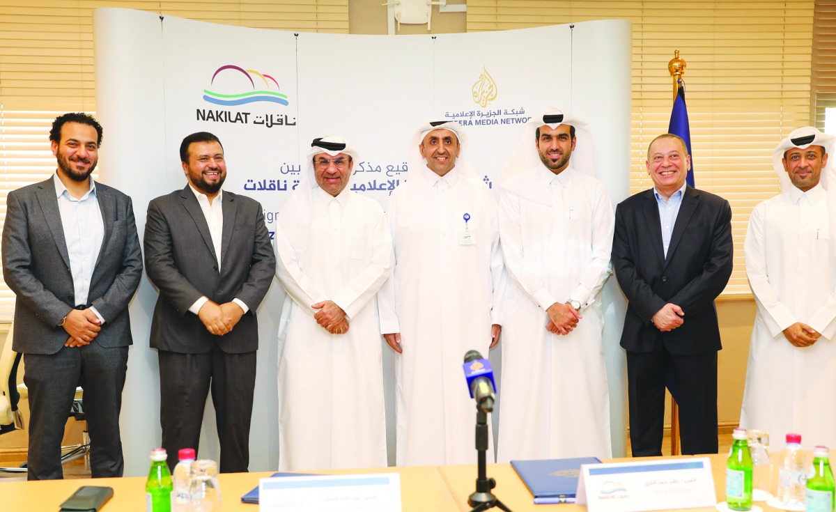 The officials during the signing ceremony. 