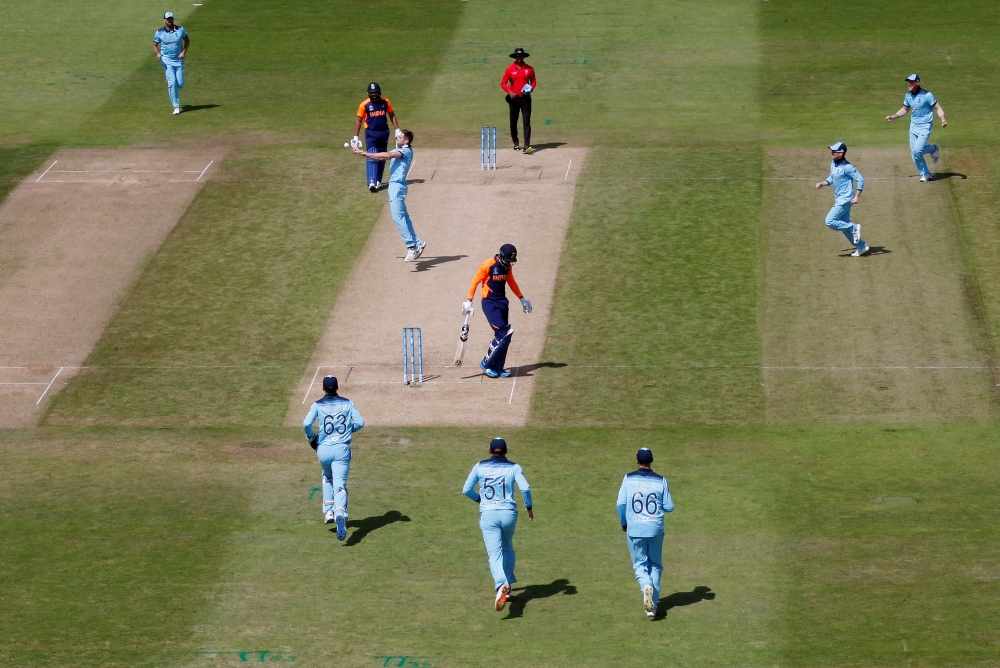 England's Chris Woakes celebrates taking the wicket of India's KL Rahul (Action Images via Reuters/Andrew Boyers)