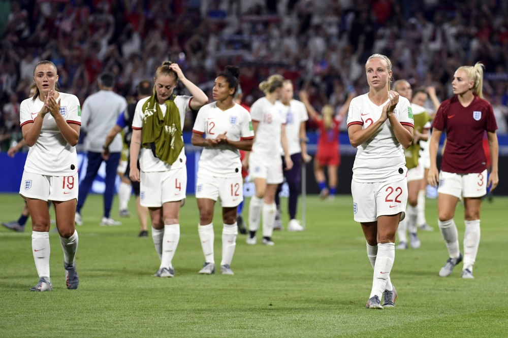 English players react at the end of the France 2019 Women's World Cup semi-final football match between England and USA, on July 2, 2019, at the Lyon Satdium in Decines-Charpieu, central-eastern France. / AFP / Philippe Desmazes