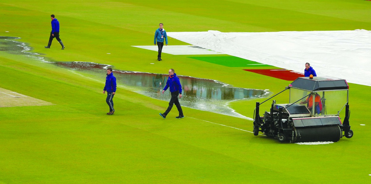 General view of water on the field during break in play due to rain. (Action Images via Reuters/Lee Smith)  
