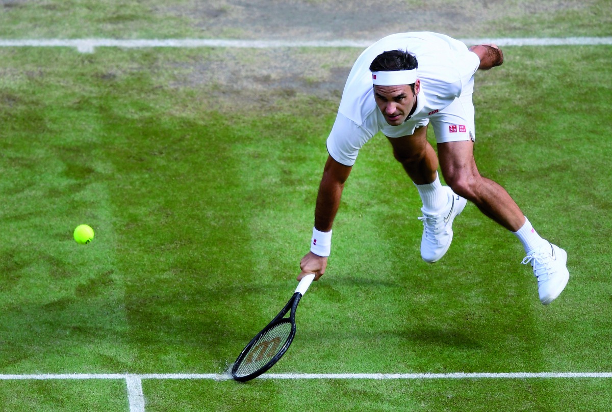 Switzerland's Roger Federer in action during his quarter final match against Japan's Kei Nishikori. Reuters/Toby Melville 