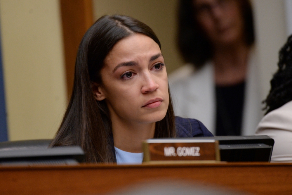 U.S. Representative Alexandria Ocasio-Cortez (D-NY) reacts to testimony from Yazmin Juarez, mother of 19-month-old Mariee, who died after detention by U.S. Immigration and Customs Enforcement (ICE); during a House Oversight Subcommittee on Civil Rights an