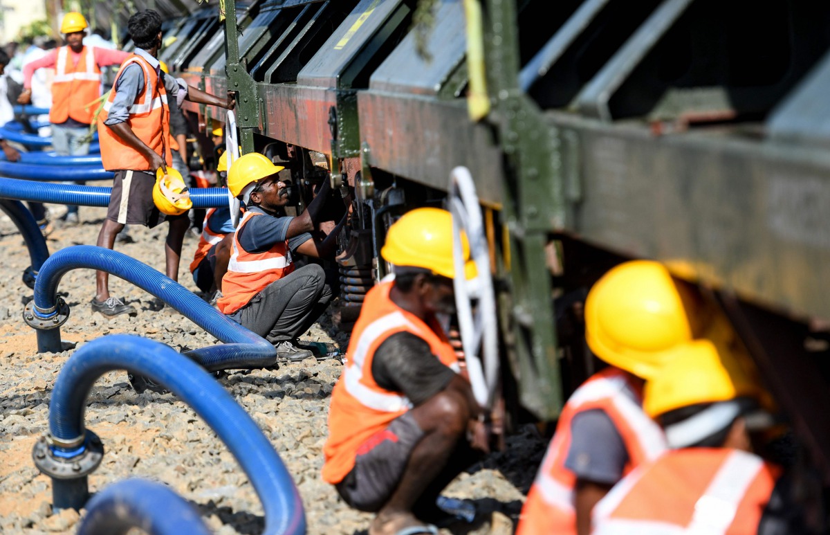 Water trucks delivering supplies to Chennai during a severe drought