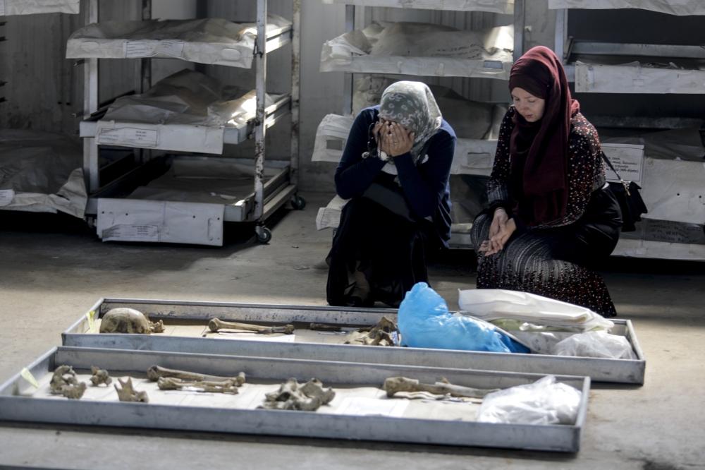 Newly identified victims of the Prijedor massacre are brought from Sanski Most to Prijedor, a northwestern Bosnian town, for a burial in Prijedor, Bosnia and Herzegovina on July 19, 2019.  (Samir Yordamoviç/Anadolu Agency)