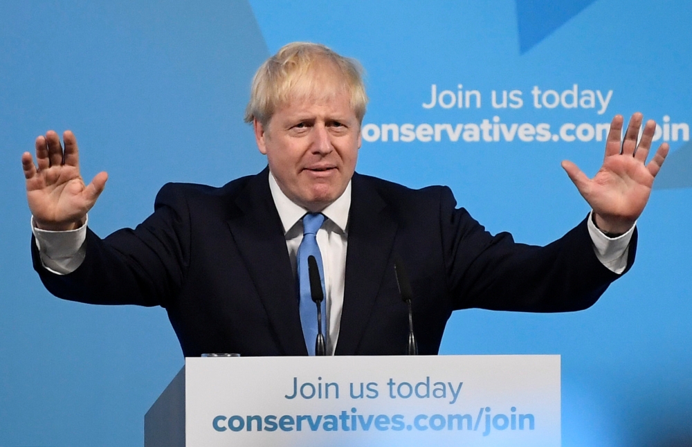 Boris Johnson speaks after being announced as Britain's next Prime Minister at The Queen Elizabeth II centre in London, Britain July 23, 2019. (REUTERS/Toby Melville)
