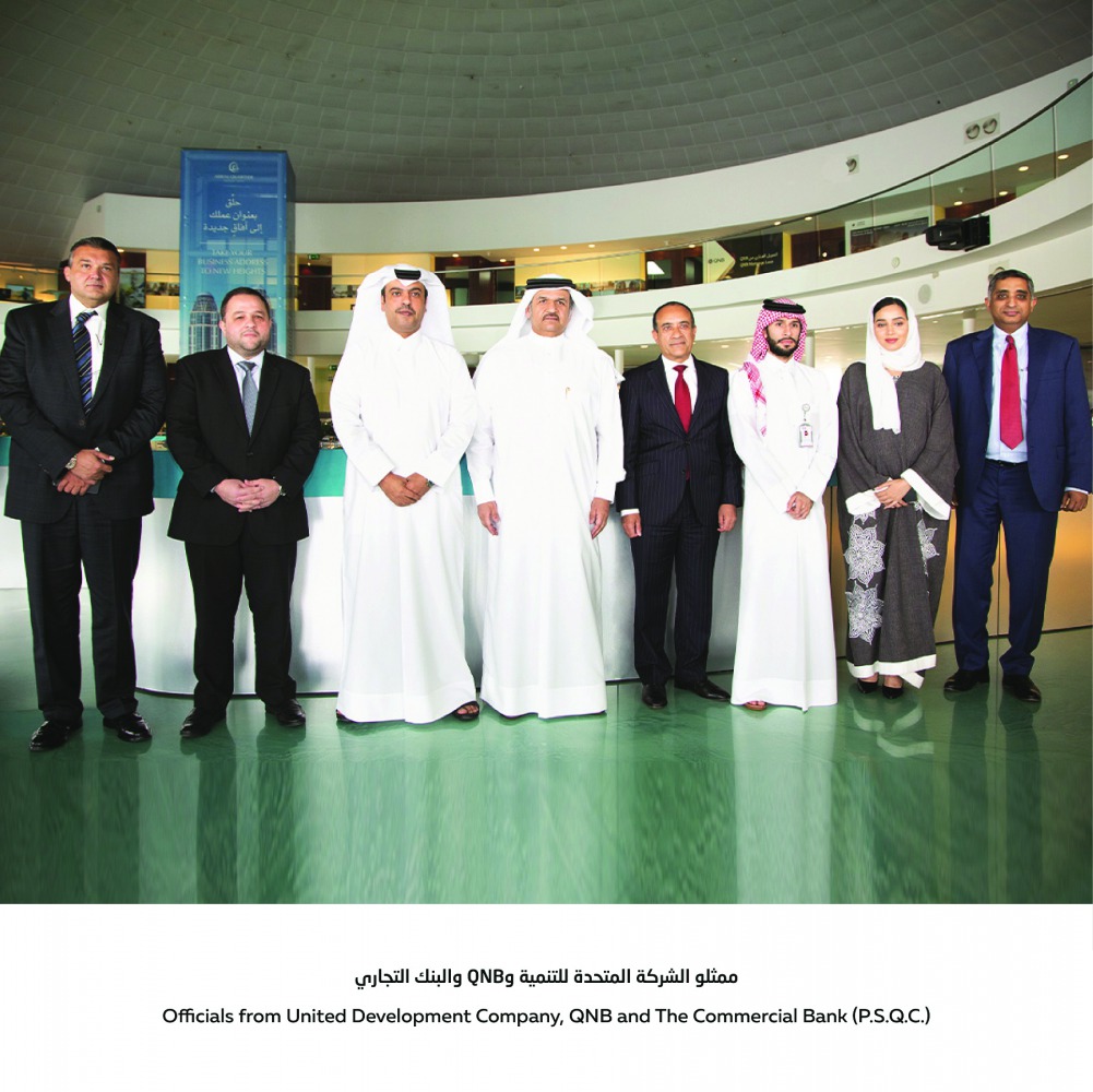 Dignitaries and officials from United Development Company, QNB and Commercial Bank after the agreement signing ceremony.