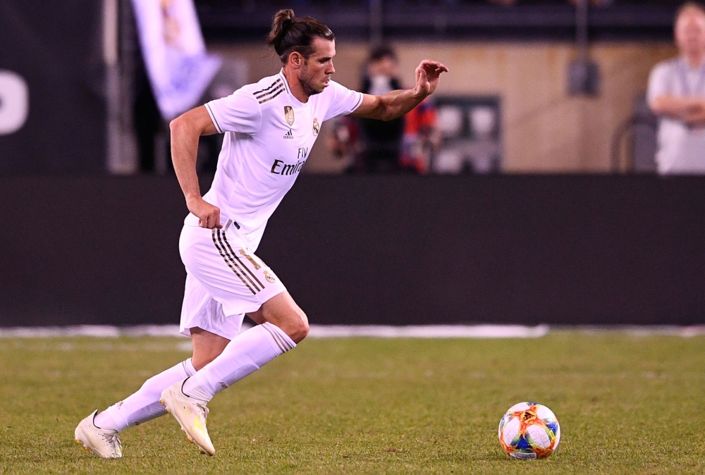Real Madrid's Welsh forward Gareth Bale vies for the ball during the 2019 International Champions Cup football match between Real Madrid and Atletico Madrid at the Metlife Stadium Arena in East Rutherford, New Jersey on July 26, 2019. (AFP / Johannes EISE