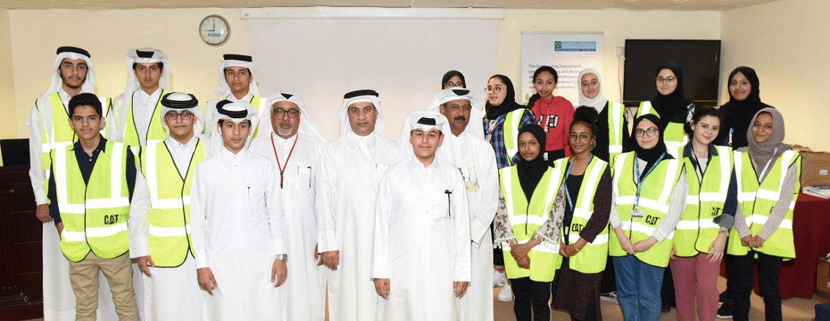 Student trainees with officials.