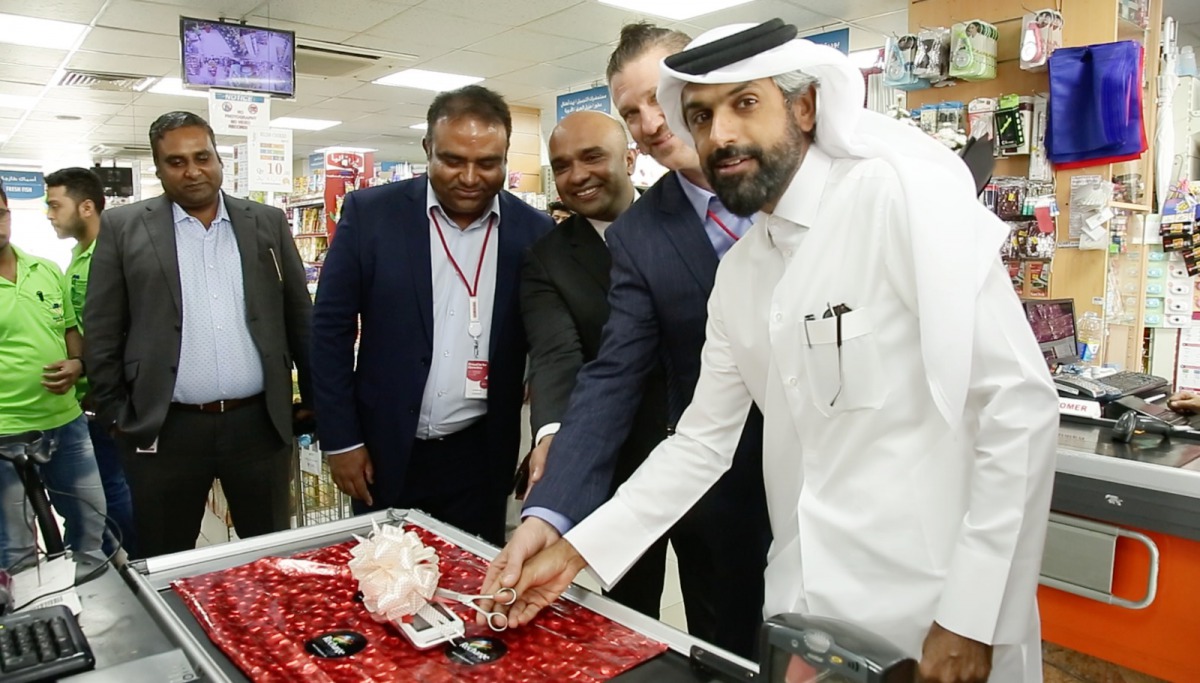 Ooredoo officials during the launching ceremony. Hala customers will no longer need to purchase paper recharge cards.
