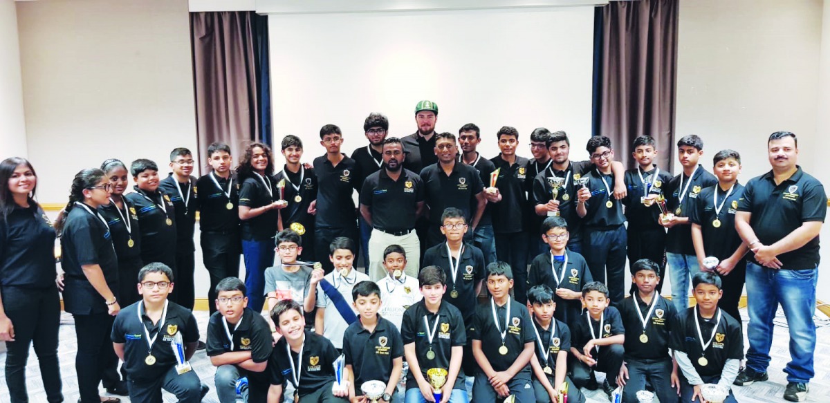 The Stallions Cricket Academy officials and players pose for a picture during their tour of England.