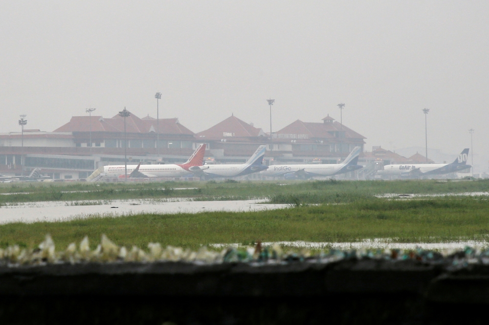 Planes are seen parked inside the flooded Cochin international airport following heavy rain, on the outskirts of Kochi, India, August 9, 2019. REUTERS/Sivaram V