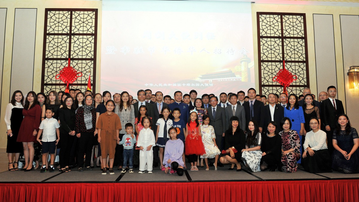 The Ambassador of China to Qatar, Zhou Jian, with Chinese community members during a reception hosted in his honour and to celebrate Eid Al Adha by the embassy at the InterContinental Hotel Doha, yesterday. Pics: Salim Matramkot/ The Peninsula