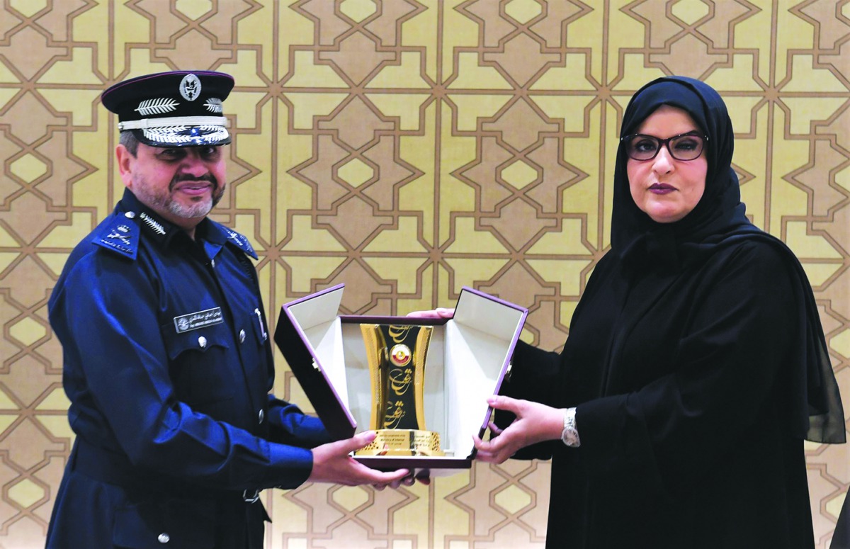 Major General Eng. Abdulaziz Abdullah Al Ansari  and Amal Abdullatif Al Mannai, after the signing ceremony.