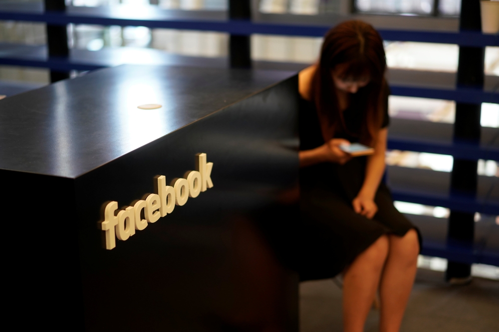 A Facebook sign is seen during the China Digital Entertainment Expo and Conference in Shanghai, August 3, 2018. Reuters/ Aly Song