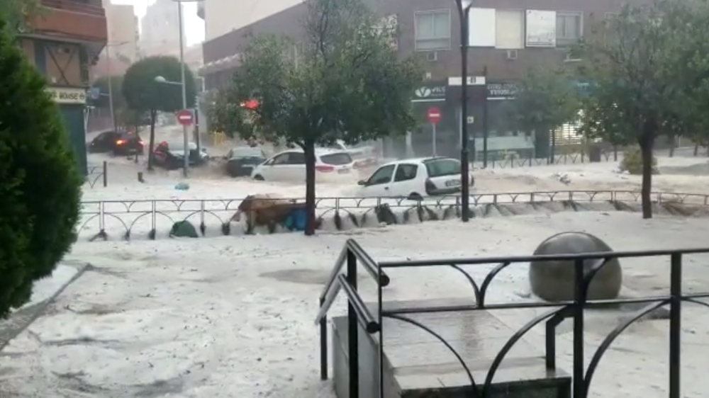 Cars are seen during the heavy rains in Arganda del Rey, Madrid, Spain in this photo grab obtained from a social media video, August 26, 2019. Isaac Garcia via Reuters