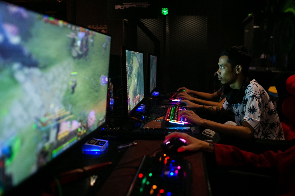 This photo taken on August 22, 2019 shows eSports professional player Myint Myat Zaw, also known as 