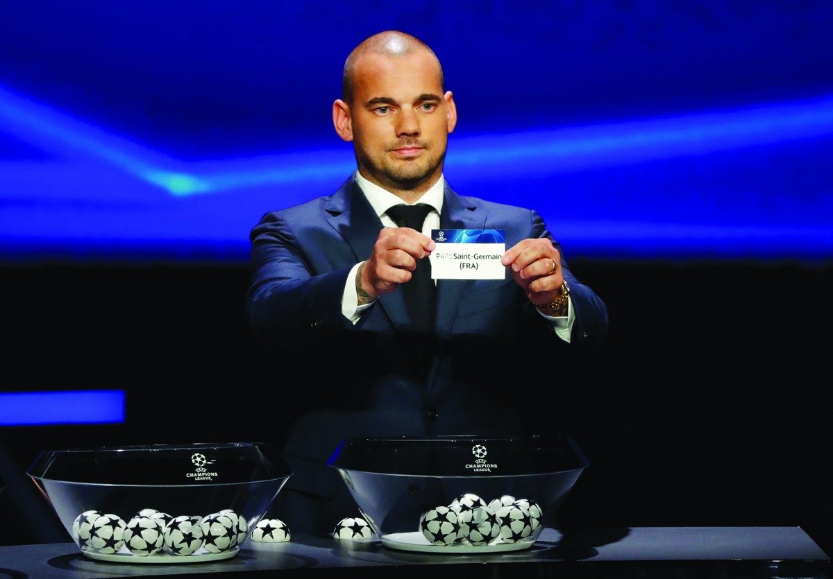 Former Netherlands player Wesley Sneijder draws Paris St Germain during the Champions League Group Stage draw REUTERS/Eric Gaillard 