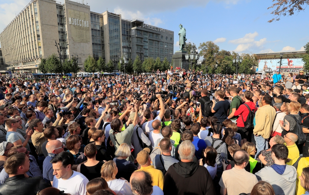 People attend a rally to demand authorities allow opposition candidates to run in the upcoming local election and release protesters, who were detained during recent demonstrations, in Moscow, Russia August 31, 2019. REUTERS/Tatyana Makeyeva
