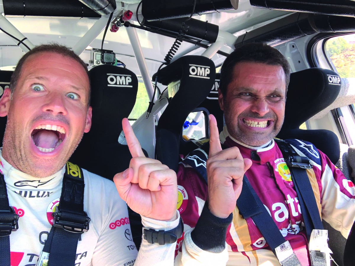 Qatar’s Nasser Saleh Al Attiyah and his French co-driver Mathieu Baumel celebrate as they win their maiden Rally of Lebanon title in the 42nd running of the event, driving a VW Polo R5, yesterday. Picture: Twitter/ @matthieubaumel