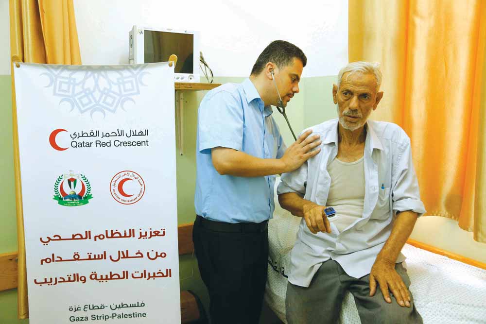 A senior citizen receiving treatment under QRCS health project in Gaza.
