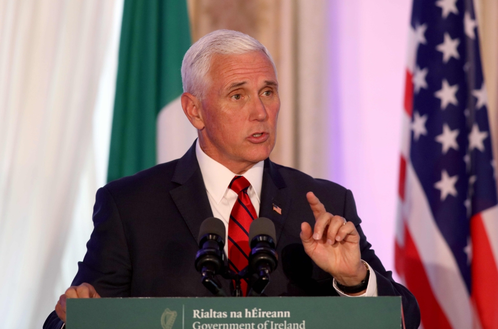 US Vice President Mike Pence speaks to members of the media after holding talks with Irish Prime Minister Leo Varadkar at Famleigh House in Phoenix Park, Dublin, on September 3, 2019, on day two of the US Vice President's visit to Ireland. / AFP / PAUL FA