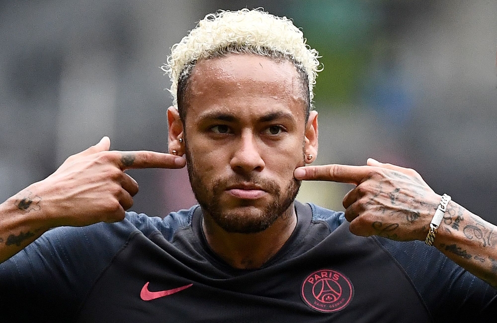 (FILES) In this file photo taken on August 03, 2019 Paris Saint-Germain's Brazilian forward Neymar reacts at the end of the French Trophy of Champions football match between Paris Saint-Germain (PSG) and Rennes (SRFC) at the Shenzhen Universiade stadium. 