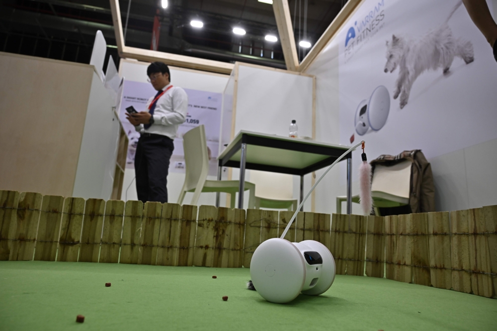 A pet feeding and fitness device is pictured at the booth of Varram at the international electronics and innovation fair IFA in Berlin on September 6, 2019. AFP / Tobias SCHWARZ