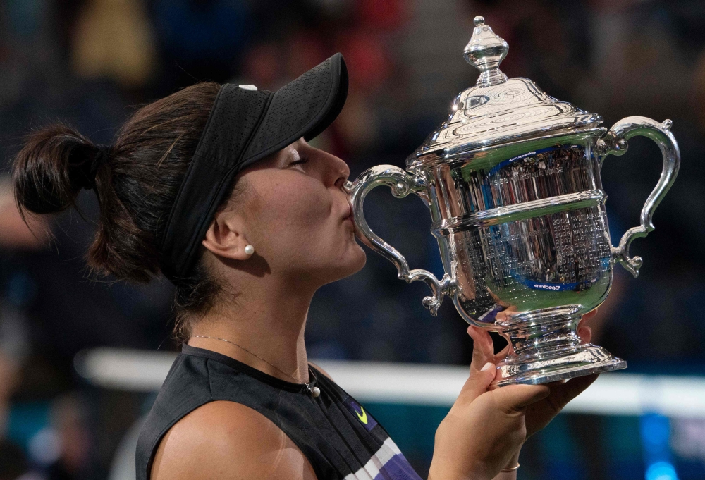 Bianca Andreescu of Canada poses with her trophy after she won against Serena Williams of the US after the Women's Singles Finals match at the 2019 US Open at the USTA Billie Jean King National Tennis Center in New York on September 7, 2019. AFP / Don Emm