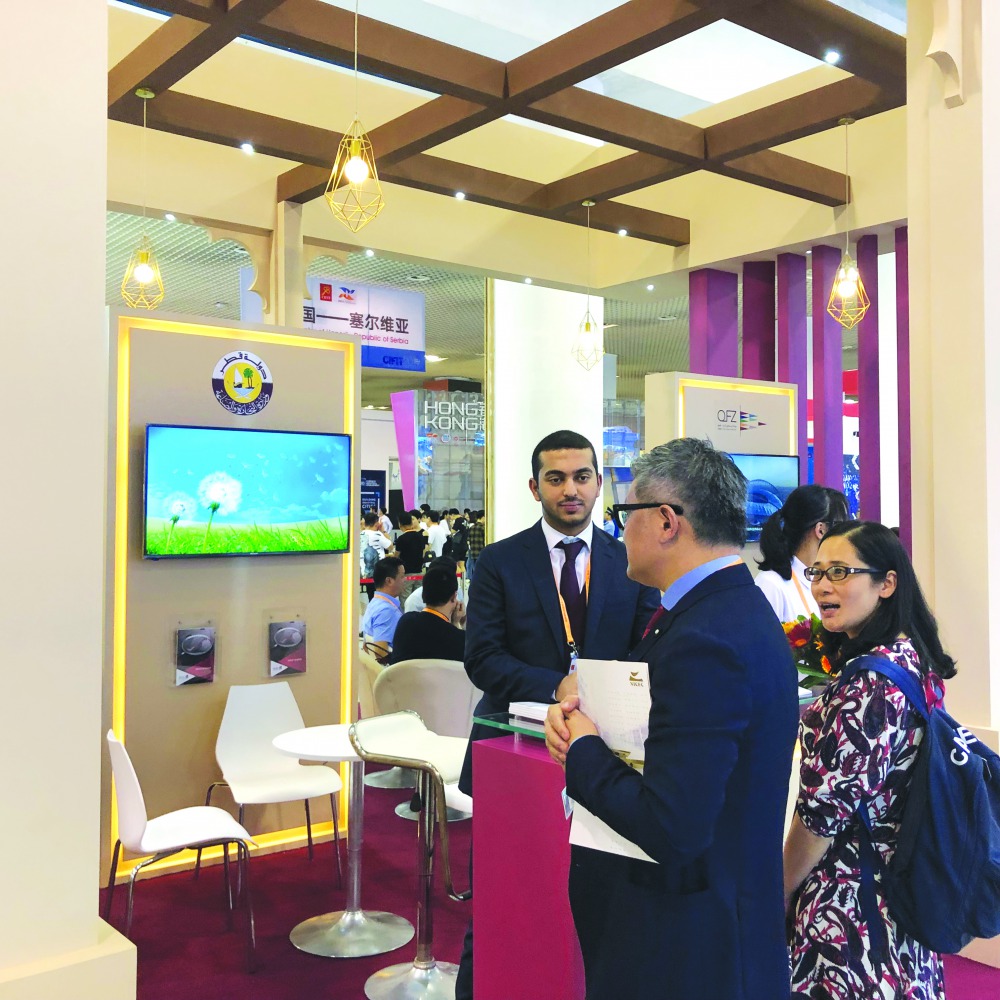 Visitors making enquiries at the Ministry of Commerce and Industry pavilion at the China International Fair for Investment and Trade.