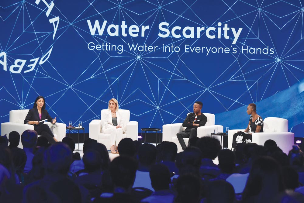 Panellists talk during a special edition of Doha Debates, in Cape Town, South Africa.