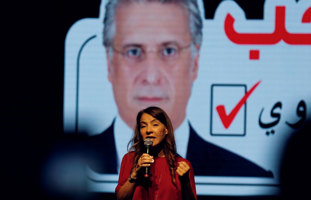 Salwa Karoui, wife of detained Tunisian media mogul and presidential candidate Nabil Karoui, speaks during an election campaign rally in Tunis, Tunisia, September 13, 2019. REUTERS/Zoubeir Souissi