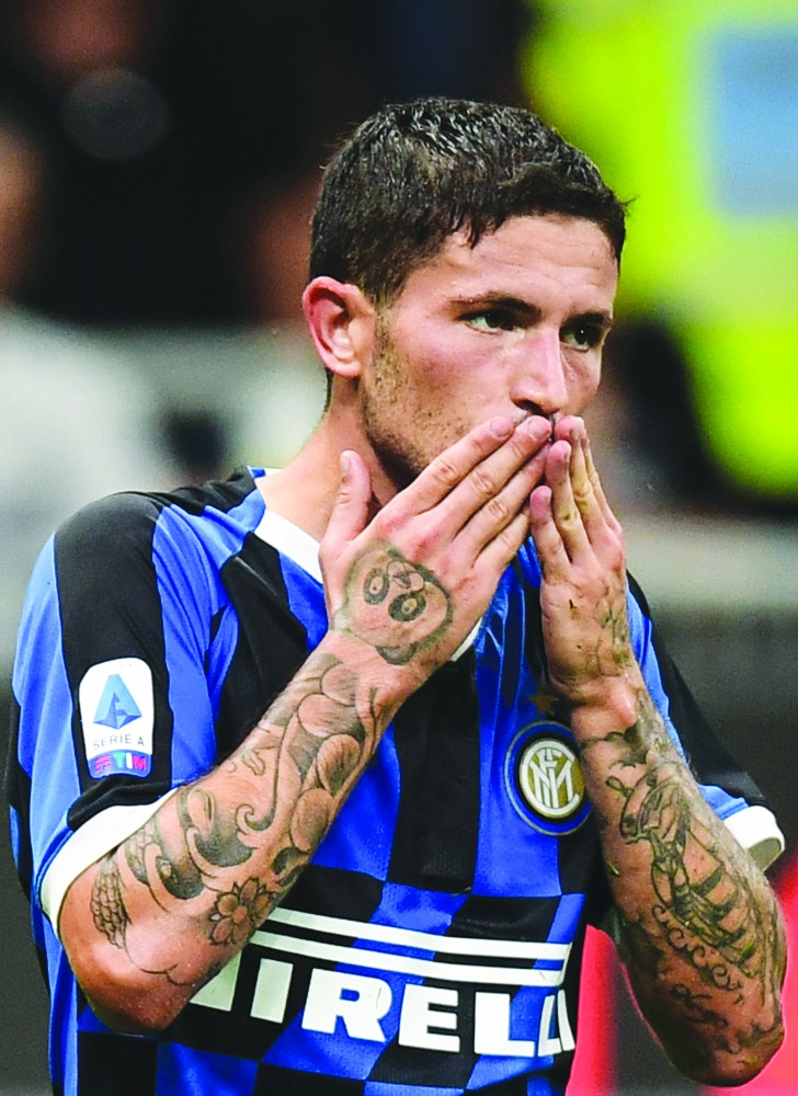 Inter Milan's Italian midfielder Stefano Sensi celebrates after opening the scoring during the Italian Serie A football match Inter Milan vs Udinese on September 14, 2019 at the San Siro stadium in Milan. AFP / Miguel Medina