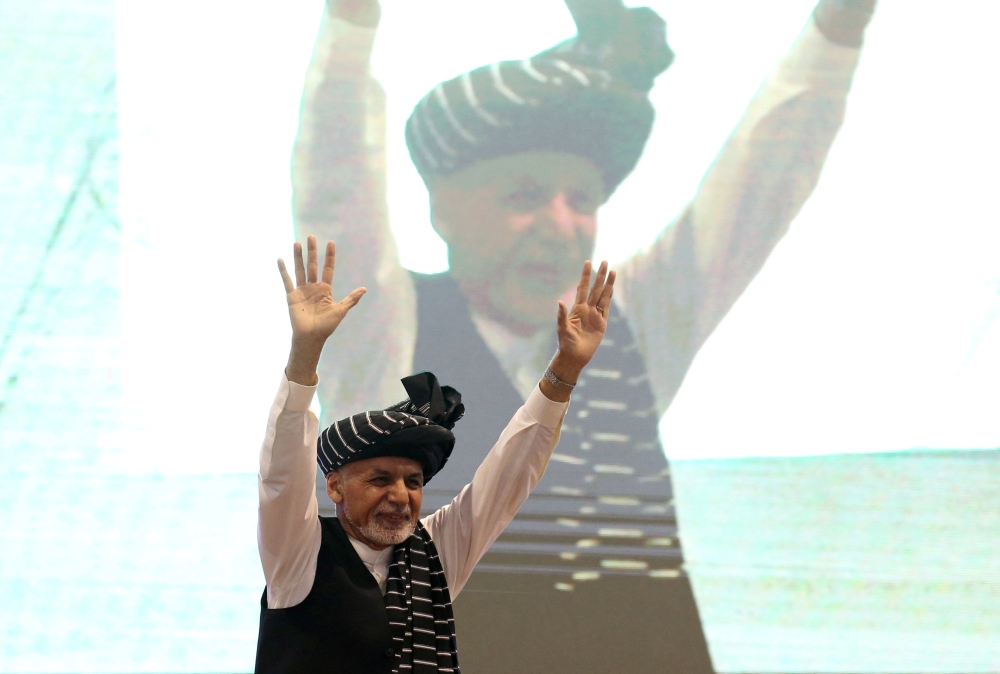 FILE PHOTO: Afghan presidential candidate Ashraf Ghani gestures during his election campaign rally in Kabul, Afghanistan September 13, 2019. REUTERS/Omar Sobhani