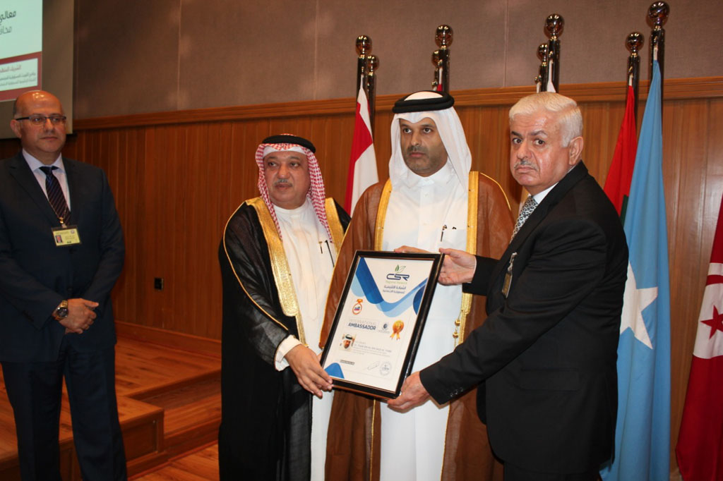 Sheikh Dr Thani bin Ali Al Thani (second right), receiving ‘international ambassador for social responsibility’ title during the event.