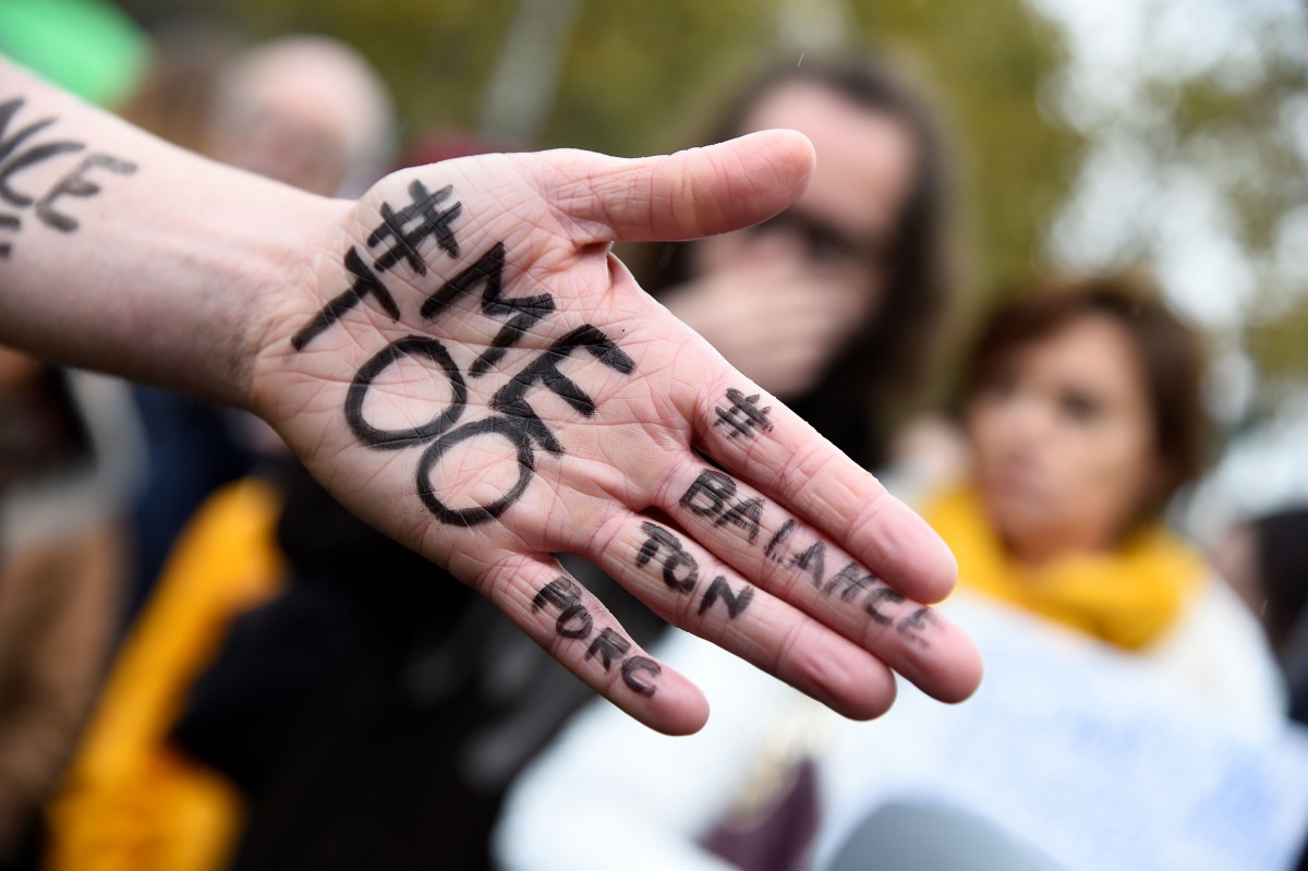 #MeToo on the hand of a protester during a gathering called by the Effronte-e-s Collective on the Place de la Republique square in Paris on October 29, 2017. AFP / Bertrand Guay