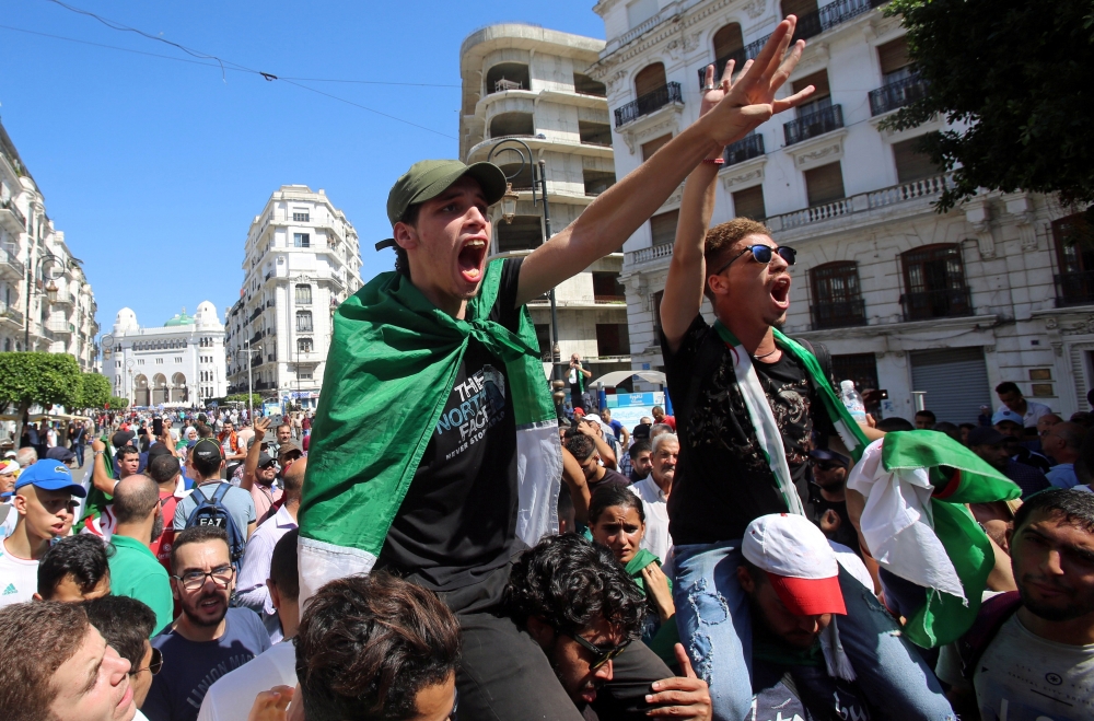 Demonstrators gesture and shout slogans during a protest demanding social and economic reforms, as well as the departure of the country's ruling elite in Algiers, Algeria, September 24, 2019. REUTERS/Ramzi Boudina