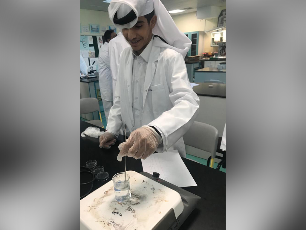 A student working on a project as part of Al Bairaq programme’s “I am Discovering Materials’ track. 