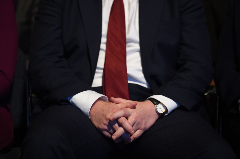 Boris Johnson listens in the audience as Chancellor of the Exchequer Sajid Javid speaks on the second day of the annual Conservative Party conference in Manchester, on September 30, 2019. AFP / Oli Scarff
 