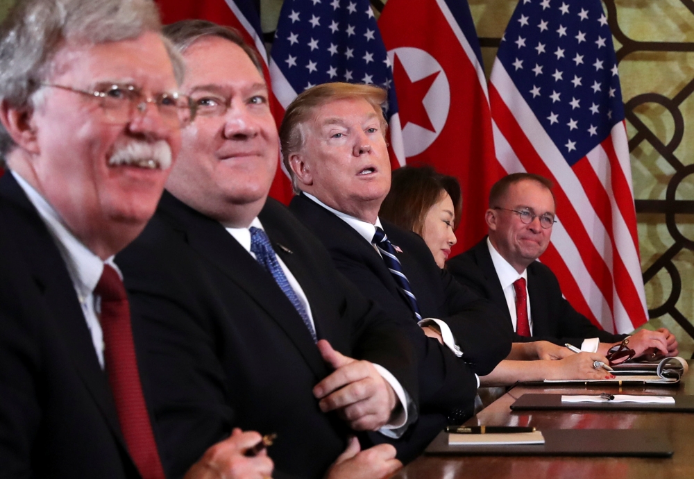 Donald Trump, Mike Pompeo, John Bolton and Mick Mulvaney attend a meeting in the Metropole hotel with Kim Jong Un and delegation in Hanoi, February 28, 2019. Reuters / Leah Millis