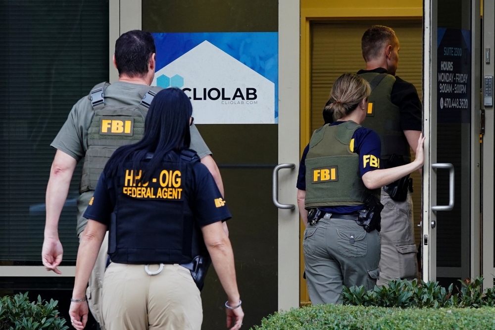 Federal agents execute a search warrant on Clio Laboratories in Lawrenceville, Georgia, US, September 27, 2019. Reuters/Elijah Nouvelage
