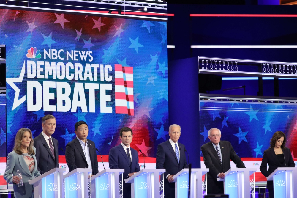 Marianne Williamson, John Hickenlooper, Andrew Yang, South Bend, Pete Buttigieg, Joe Biden, Bernie Sanders, Kamala Harris in second night of debate on June 27, 2019 in Miami. (Drew Angerer/Getty Images/AFP) 
