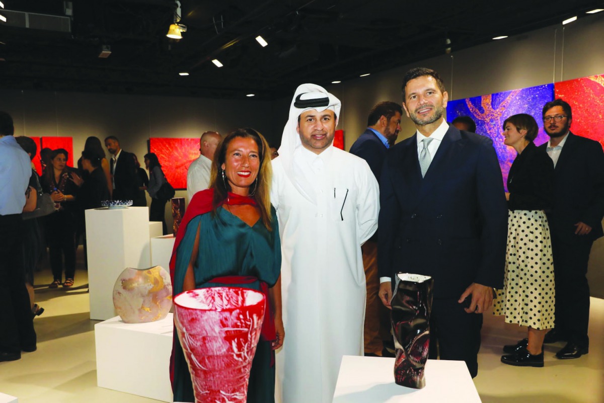 FROM LEFT: Doha-based Italian artist Caterina Varchetta; Katara General Manager, Dr. Khalid bin Ibrahim Al Sulaiti; and Italian Ambassador to Qatar, Pasquale Salzano at the opening of “No boundaries” exhibition at Katara Cultural Village on Wednesday.