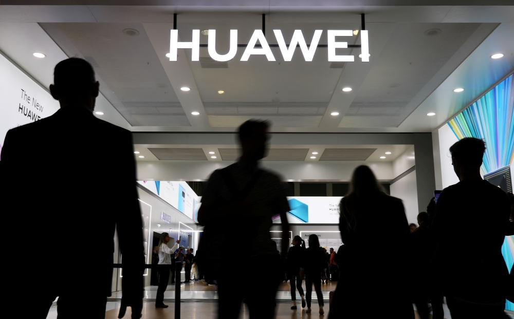 The Huawei logo is pictured at the IFA consumer tech fair in Berlin, Germany, September 6, 2019. REUTERS/Hannibal Hanschke 